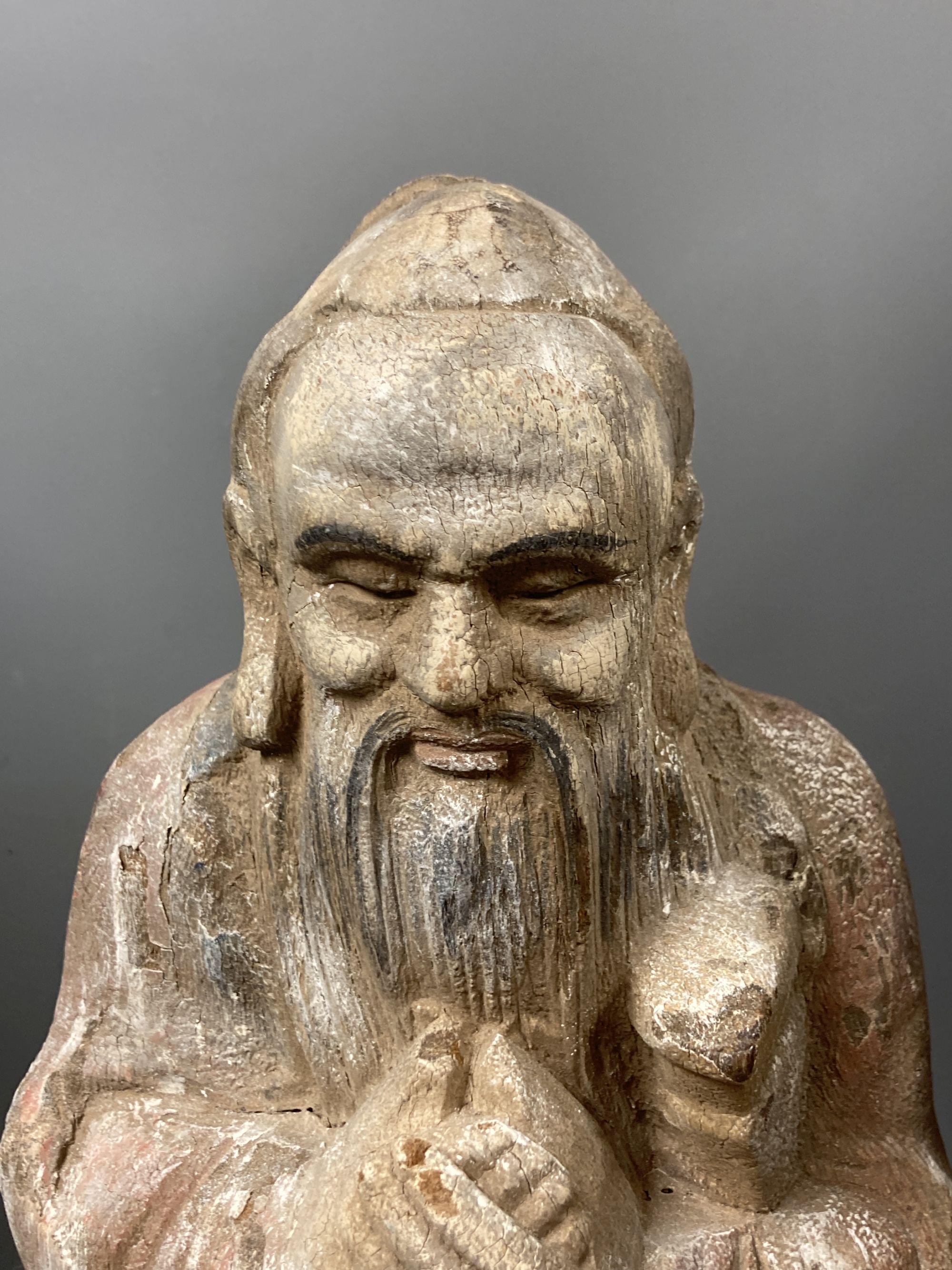 A Chinese carved wood deity, height 60cm